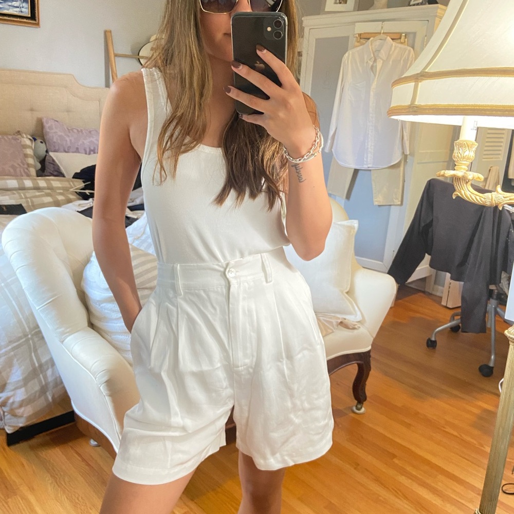 DONNI. White High-Waist Pleated Shorts